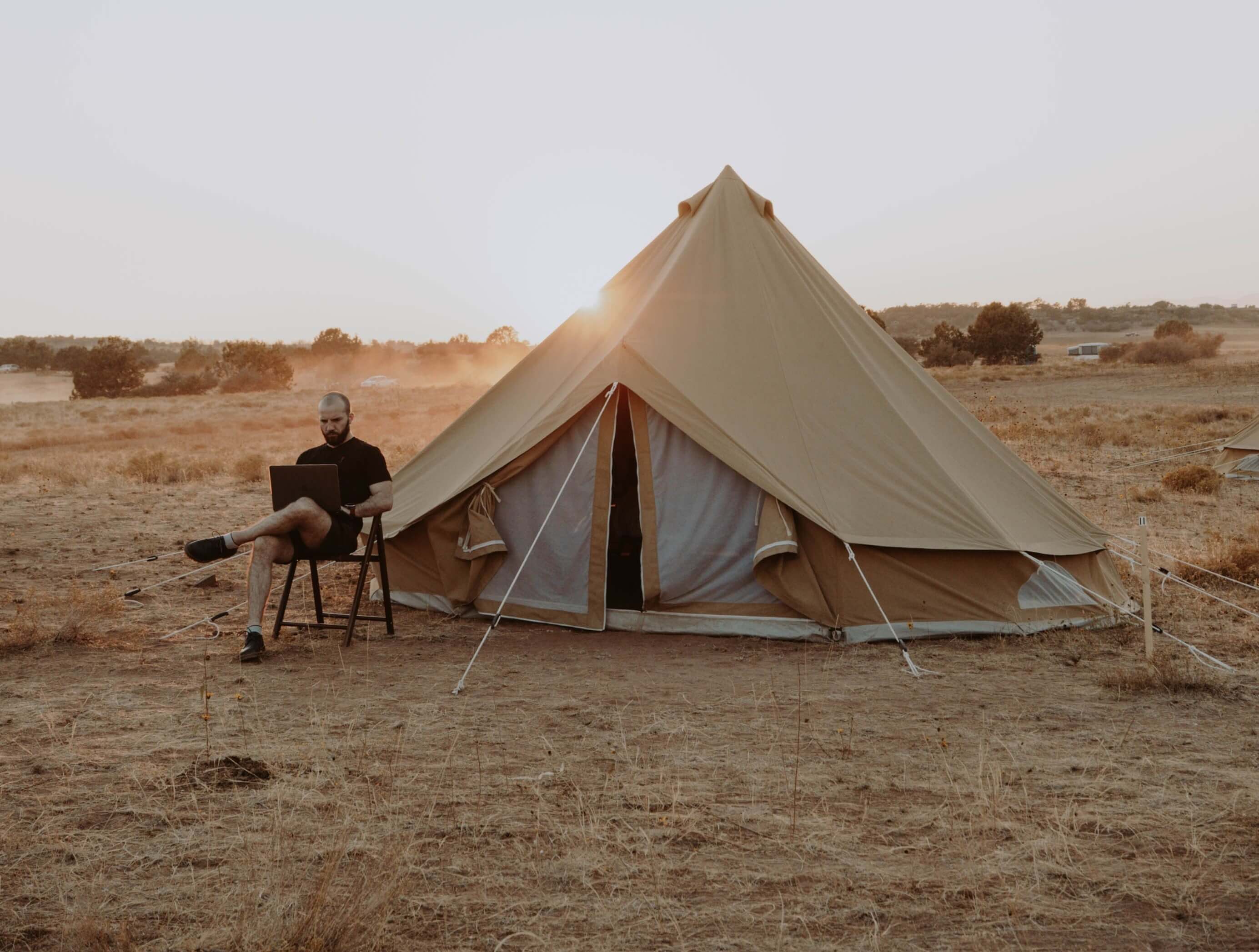 Man in front of Tent